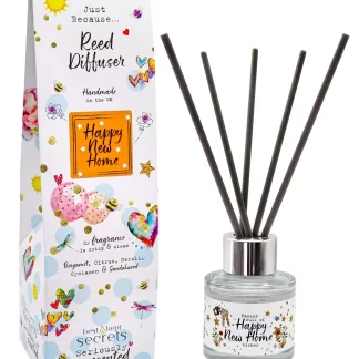 Happy New Home Sparkly Reed Diffuser (50ml) with clear glass bottle, natural reeds, and metallic cap, presented in elegant packaging with Classic Cotton scent.
